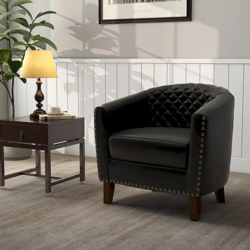 Fauteuil rond en cuir PU avec clous décoratifs