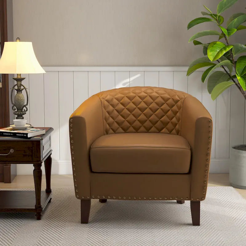 Fauteuil rond en cuir PU avec clous décoratifs